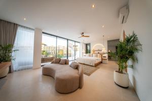 a large living room with a bed and a couch at Elements B3 Villa Bingin in Bingin Beach +21 photos