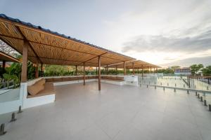 a rendering of the roof of a building with benches at Elements B3 Villa Bingin in Bingin Beach