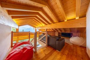 Ένα ή περισσότερα κρεβάτια σε δωμάτιο στο Chalet Nendaz - moderne et paisible