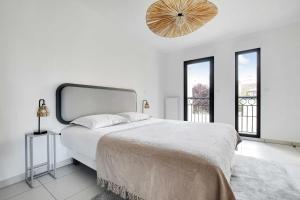 Katil atau katil-katil dalam bilik di Elegant Appt - 1BDR-2P - Near Paris & La Defense