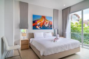 Ένα ή περισσότερα κρεβάτια σε δωμάτιο στο 2 bedroom top floor sea view apartment - KBR39 +14 φωτογραφίες