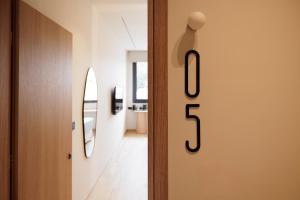 a door with the word open written on it at Avia in Corfu