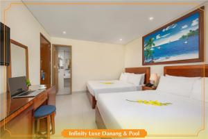 Μια τηλεόραση ή/και κέντρο ψυχαγωγίας στο Cherry Beach Hotel +16 φωτογραφίες