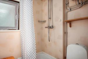 a small bathroom with a shower and a toilet at KAL149-Fagerhult-Arhult-1-23 in Fagerhult +19 photos