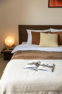 Ένα ή περισσότερα κρεβάτια σε δωμάτιο στο Late December Villa