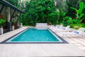 Bazén v ubytování Woodlands Family Villa nebo v jeho okolí