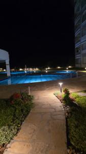 an empty parking lot at night with at The Cabana at Baobab Waves in Mombasa