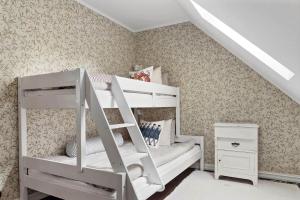 Ένα ή περισσότερα κρεβάτια σε δωμάτιο στο HAL641-Unnaryd-Yas-108