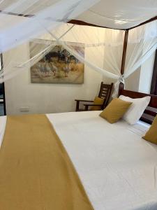 Postel nebo postele na pokoji v ubytování Woodlands Family Villa + 47 fotografií