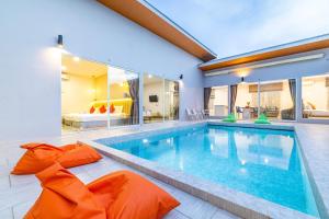 a large swimming pool in a house at Andaman Sea Best Pool Access and Villas in Phuket Town