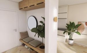 sala de estar con espejo y sofá en Riversidesuite-Tuebingen, en Tübingen