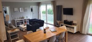 Et opholdsområde på Ferienhaus Moin & Ahoi