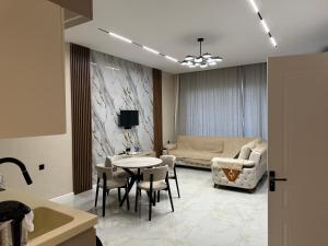 TV a/nebo společenská místnost v ubytování Sea Breeze