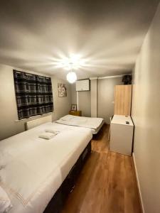 Кровать или кровати в номере Van House +20 фотографий