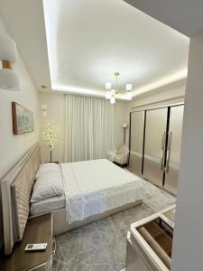 Ένα ή περισσότερα κρεβάτια σε δωμάτιο στο 3 BHK fully furnished luxury flat +27 φωτογραφίες