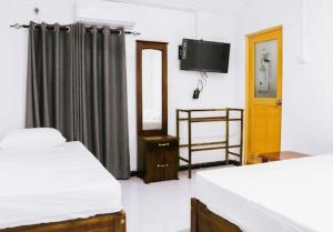 Postel nebo postele na pokoji v ubytování Meegas Sewana Resort