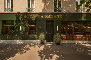 a store front of a marriott at Hôtel Marguerite in Paris
