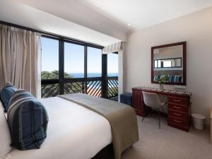 Postel nebo postele na pokoji v ubytování ANEW Hotel Ocean Reef Zinkwazi