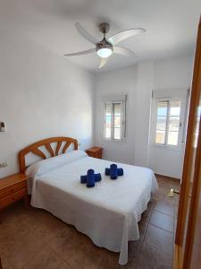 Ένα ή περισσότερα κρεβάτια σε δωμάτιο στο Apartamentos Cala Enmedio Cabo de Gata