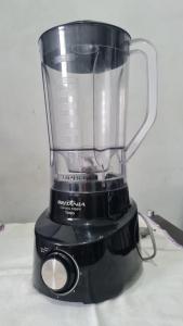 a black blender sitting on top of a counter at Apartamento kitnet frente ao mar in São Vicente