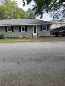 a house with a truck parked in front of it at 2 bedroom Saratoga Springs in Saratoga Springs