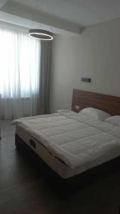 Una cama o camas en una habitación de Crystal Loft A409