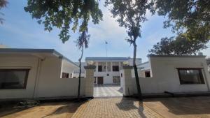 a view of the front of a building at Vardha Greens Resort in Greater Noida