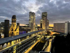 a view of a city with a building and buildings at Skyline City Apartment in Berlin