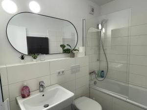 Koupelna v ubytování Skyline City Apartment