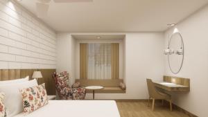ein Schlafzimmer mit einem Bett, einem Schreibtisch und einem Tisch in der Unterkunft Lemon Tree Premier, Tirupati in Tirupati + 3 Fotos