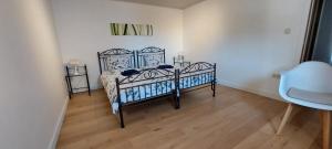 Cama o camas de una habitación en Vertentenhuis 56 fotos más