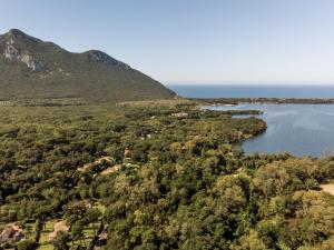 an aerial view of a lake and a mountain at Holiday Home La casina nel bosco by Interhome in SantʼAlfonso
