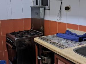 Kuchyň nebo kuchyňský kout v ubytování غرف فندقية للايجار + 23 fotografií