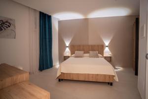 Ένα ή περισσότερα κρεβάτια σε δωμάτιο στο B&B Villa M S