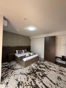 Katil atau katil-katil dalam bilik di Zamon Hotel