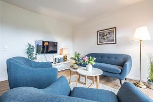 Posezení v ubytování Kapitänshaus Harrislee - Schotstek