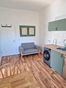 Η κουζίνα ή μικρή κουζίνα στο 2-Zimmer Wohnung 4 - Apartments am Schloss +3 φωτογραφίες