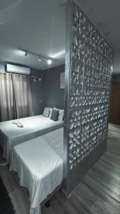 Ένα ή περισσότερα κρεβάτια σε δωμάτιο στο LOFT 03 - UFPE - UFRPE - Caxangá - Cordeiro