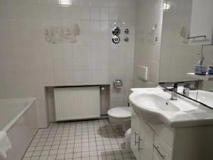 Koupelna v ubytování Landhaus Feilner + 30 fotografií