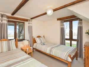 Postel nebo postele na pokoji v ubytování Miller's Cottage -Uk48595