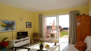 TV a/nebo společenská místnost v ubytování El Guirre N 10