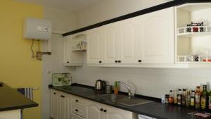 Kuchyň nebo kuchyňský kout v ubytování El Guirre N 10