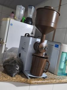 Η κουζίνα ή μικρή κουζίνα στο Hostel Evaldo Oliveira