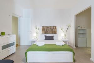 A bed or beds in a room at B&B Nonno Gino
