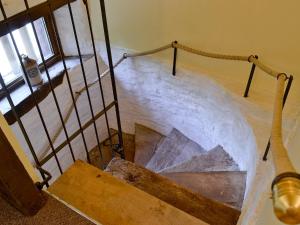 a staircase covered in snow in a building at Mill Cottage in Peterchurch