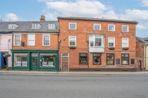 バンゲイにあるThe Loft, Bungayの通路側レンガ造り