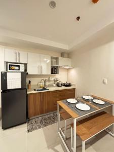 Η κουζίνα ή μικρή κουζίνα στο 1BR Matina Enclaves a Walk to SM & DGT