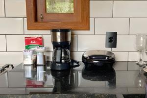 Una cocina o cocineta en Cabana Solaris - Cabanas Lua Nova