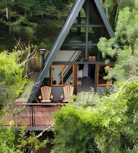 Un jardín fuera de Cabana Solaris - Cabanas Lua Nova