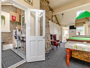a room with a pool table and a bar at Greystones Nawab Annex C in Monyash +13 photos